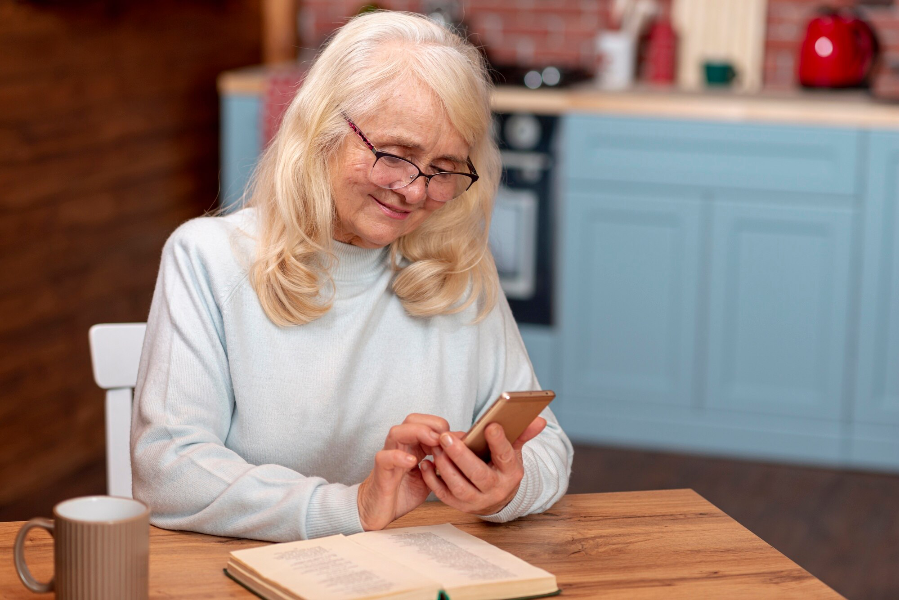 High angle woman using smartphone